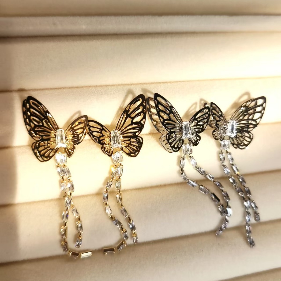 Wholesale 925 silver needle earrings, trendy and fashionable, long diamond-encrusted tassel butterfly hollowed-out earrings and earrings full figure