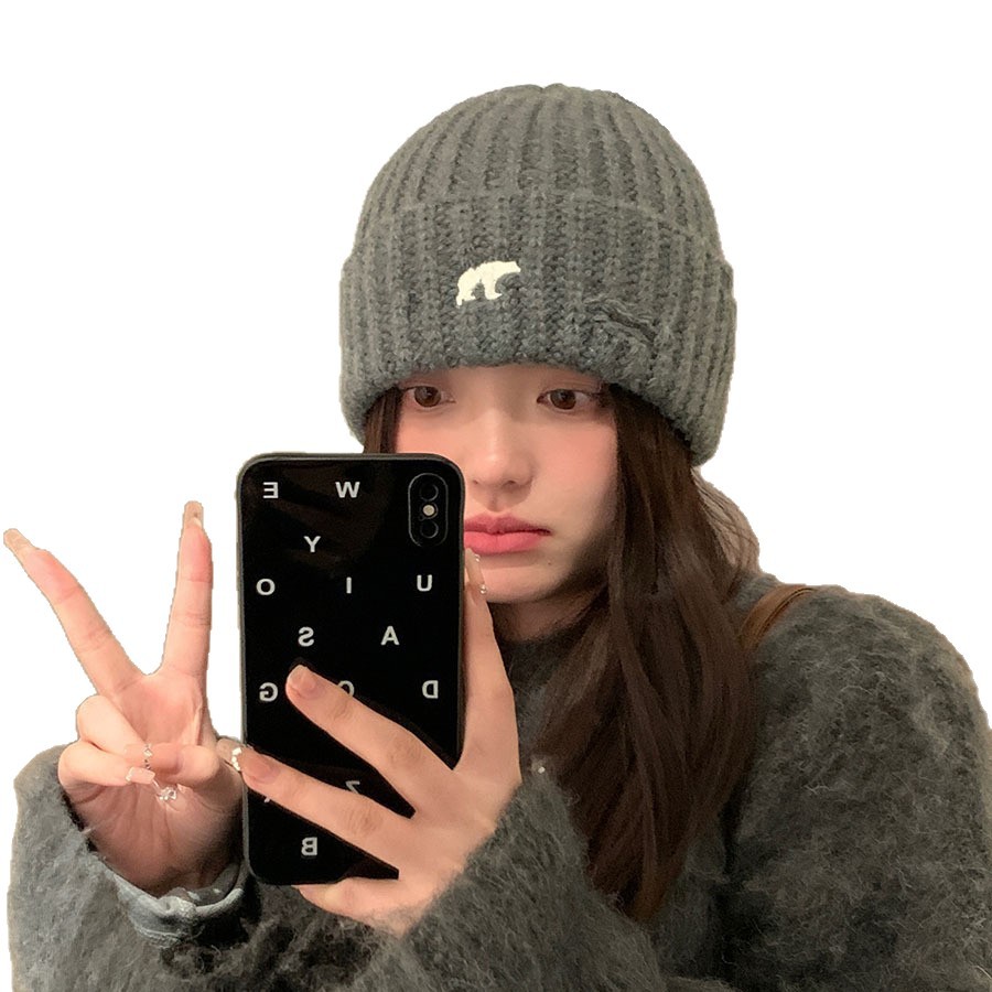 The new Korean style of the 2025 knitted cap for women's autumn and winter is versatile and warm. The thick woolen cap with a large head and ear guard makes the face look smaller Item Picture
