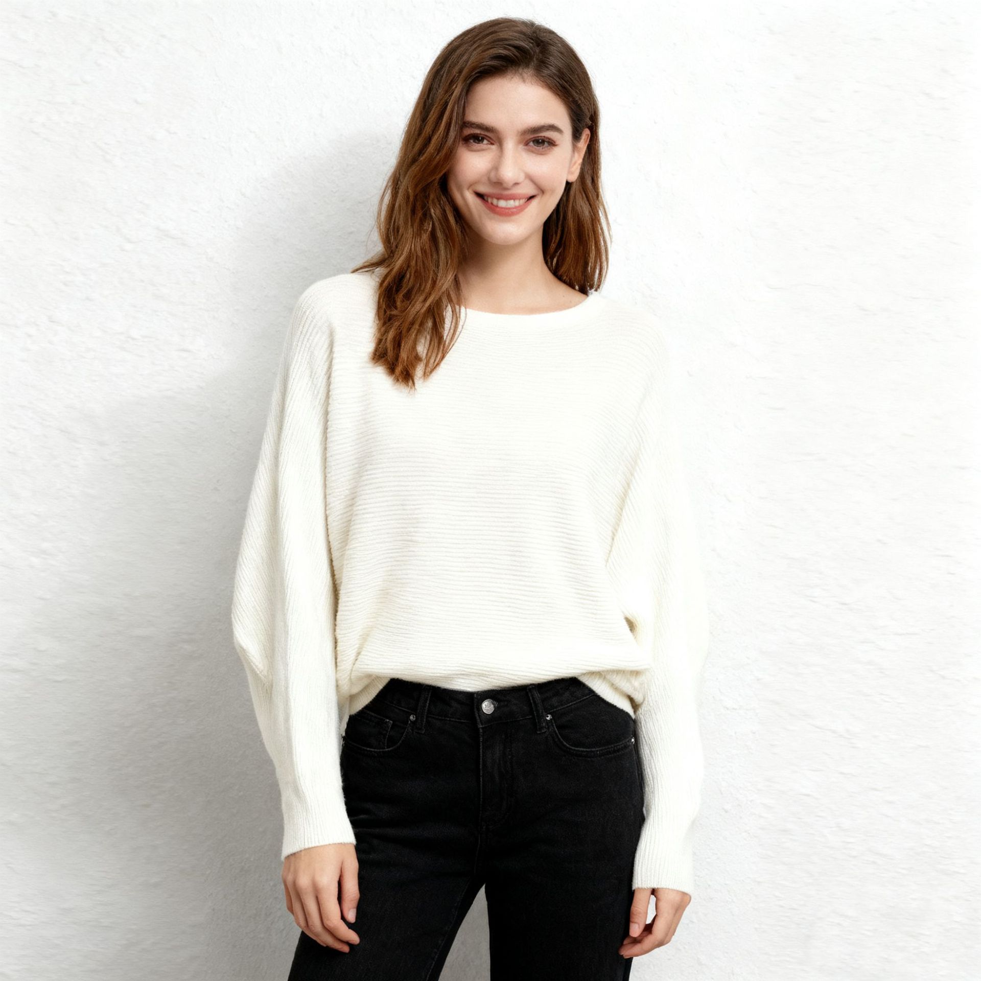A loose knitted sweater with a one-shoulder collar and bat sleeves in stock. It's a great recommendation for women. You can come and buy it Application Scenario
