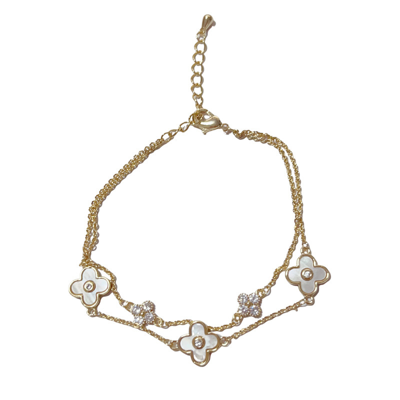 This fresh, fashionable and light luxury design double-layer shell four-leaf flower bracelet is a versatile and high-end accessory for daily commuting Item Picture
