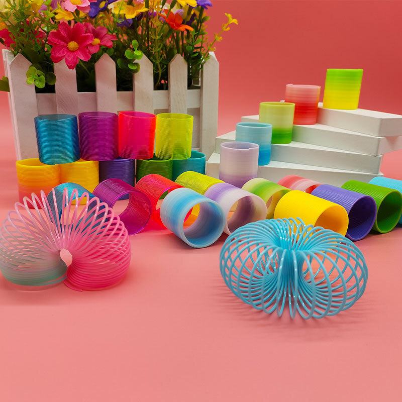 Small rainbow hoop toy wholesale street stall, educational quality gradient spring hoop play magic hula hoop cross-border details Picture