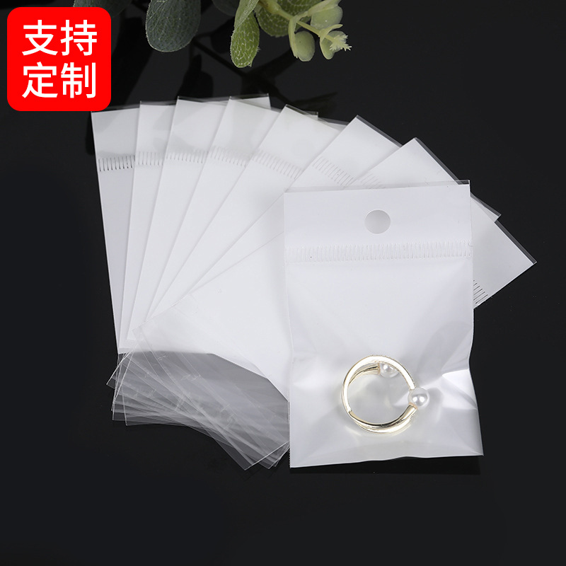 厂家opp卡头印刷袋外贸珠光膜塑料包装透明不干胶内膜卡头自粘袋产品图