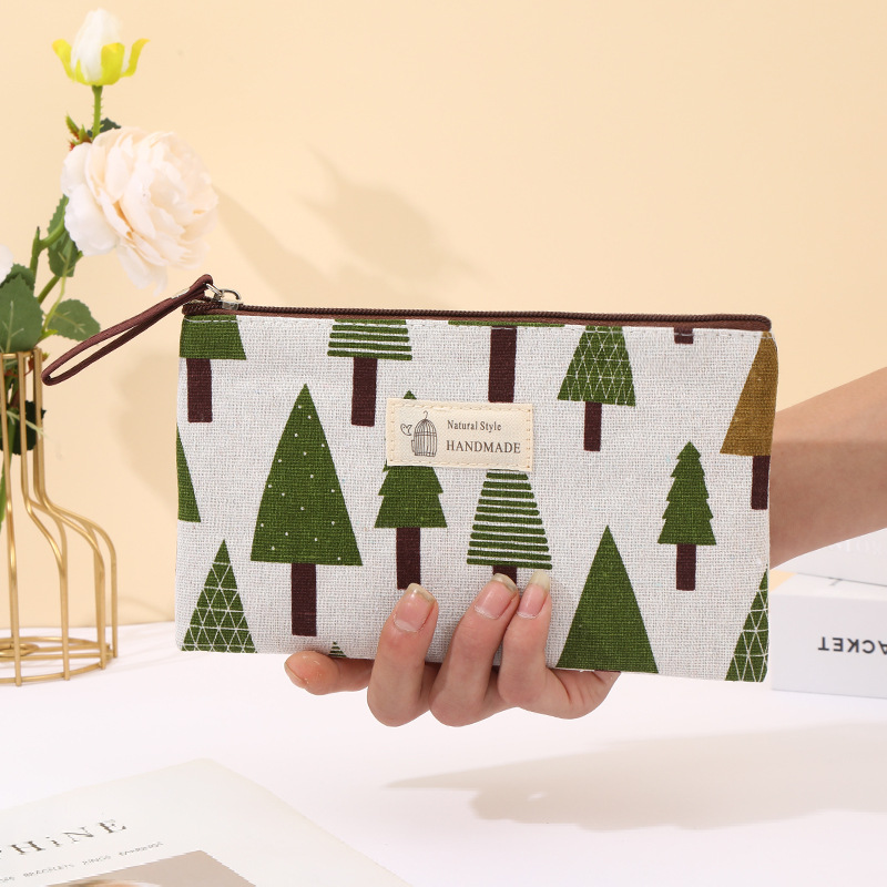 Cross-border wholesale cotton makeup bag, cartoon print, multi-functional, hand in hand, loose change, zipper pen case, storage bag Specification image