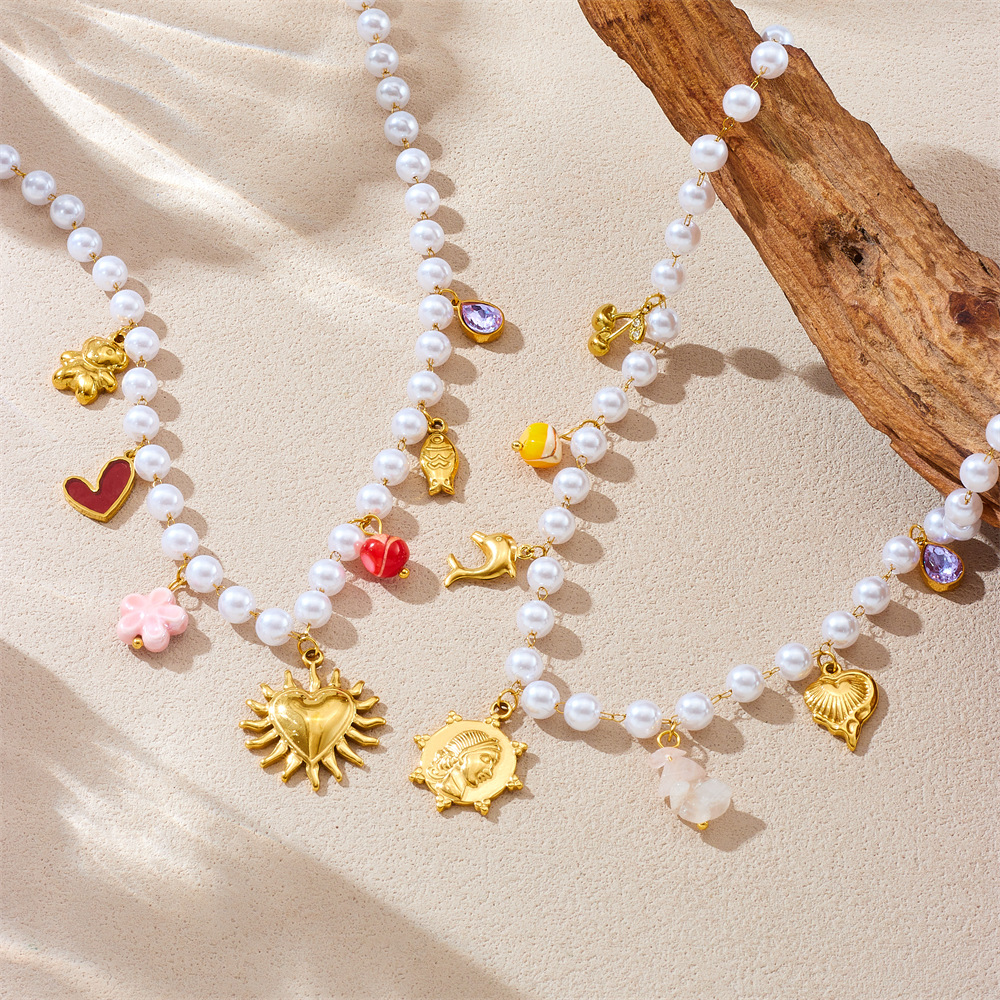 欧美跨境气质复古珍珠链镀金不锈钢光面爱心圆牌人像头海豚项链