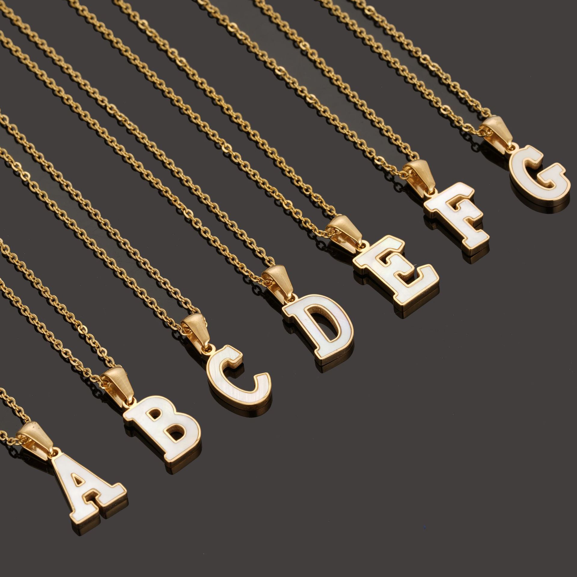 Wholesale cross-border 18K gold shell stainless steel letter pendants, 26 capital letter titanium steel necklaces for women Specification image