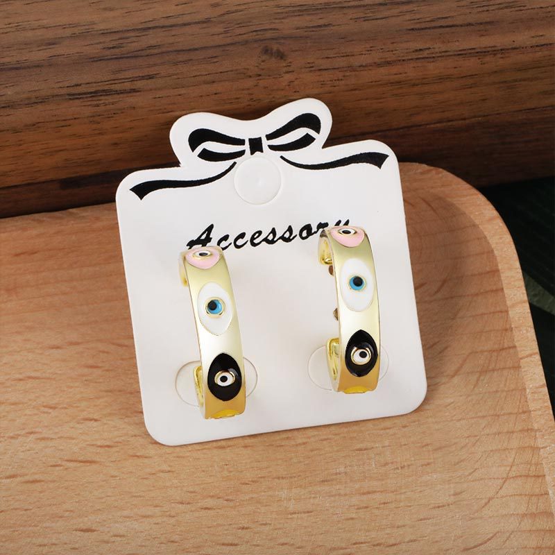 Wholesale of fashionable, colorful eye oil stud earrings from Europe and America, personalized and versatile geometric earrings details Picture