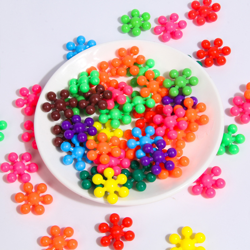 跨境热卖梅花积木立体拼装早教益智3D旋转拼插雪花片玩具批发