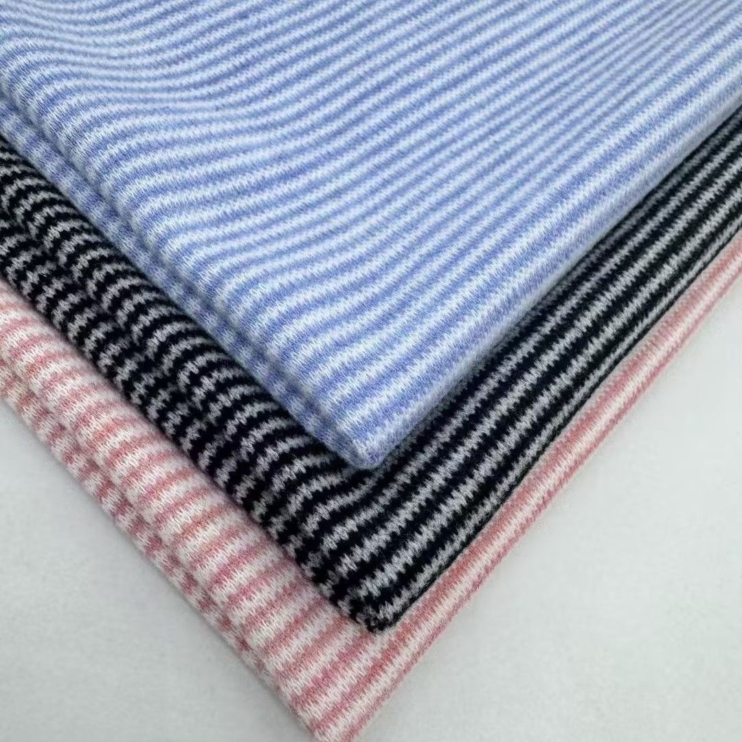 In stock, TR-colored spun 817# sheepskin wool horizontal striped knitted fabric is available for autumn and winter warm base layer and home wear Application Scenario