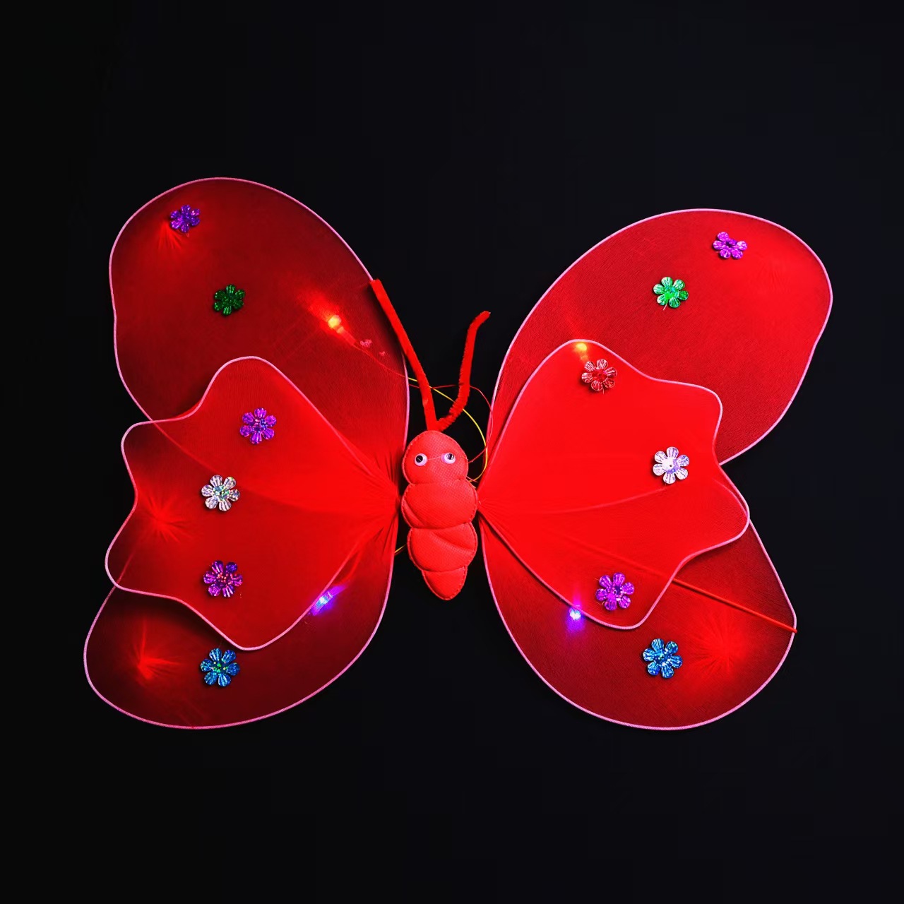 Children's illuminated butterfly wings with double-layer lights on the back of the wings are used as props to set up stalls. Small toys are selling well at night markets Application Scenario
