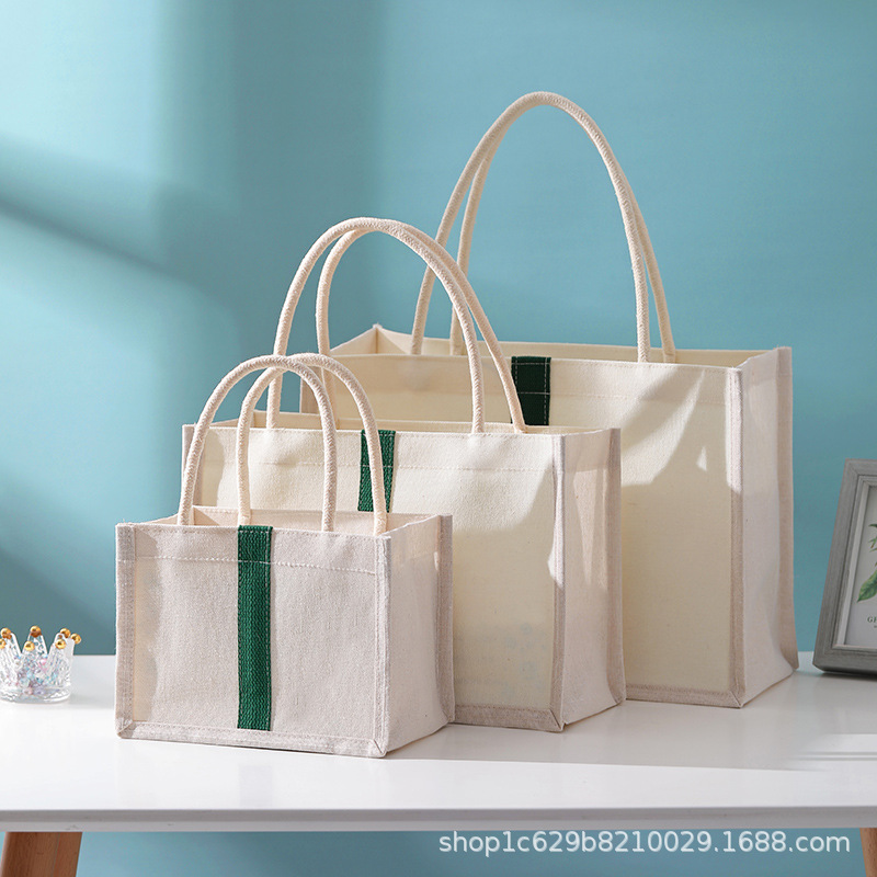 Wholesale of laminated canvas bags in stock, eco-friendly hand-held canvas bags, single-shoulder hand-painted canvas bags with logo printing, cotton and linen bags