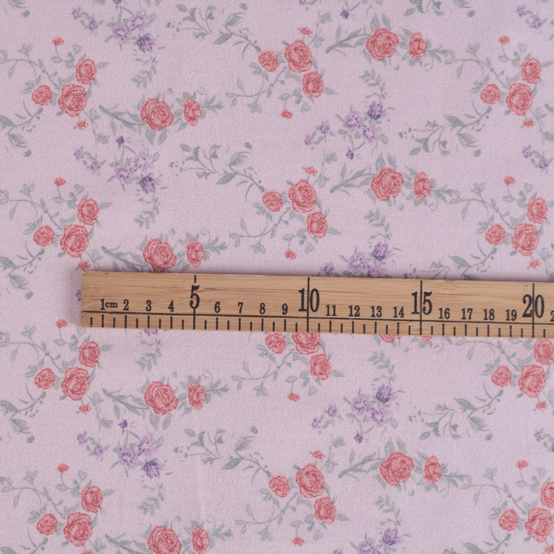 现货全面磨毛印花面料苏醒花碎花布秋款娃衣童装连衣裙面料