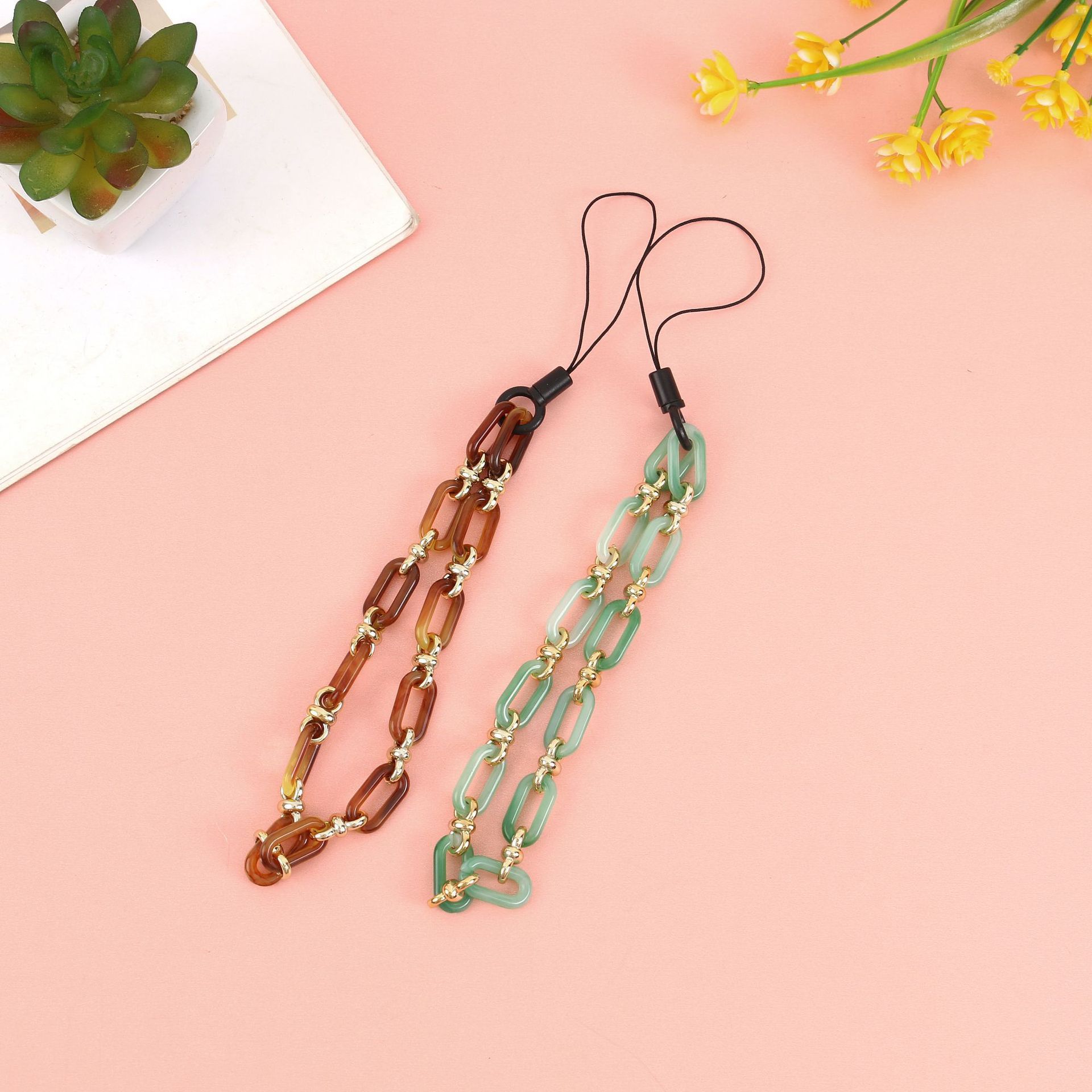 Cross-border new best-selling solid-color acrylic gold ring buckle mobile phone chain, creative mobile phone pendant, short mobile phone lanyard for women details Picture