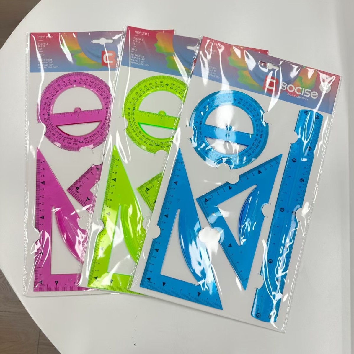 Venta directa de fábrica conjunto de cuatro piezas PVC soft sleeve rule triangular rule straight transferer en stock logotipo impreso texto de talento