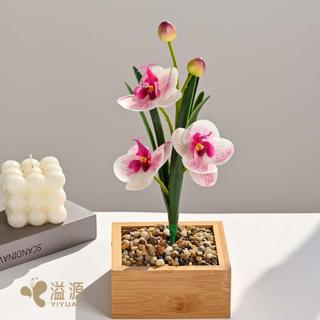 The small Phalaenopsis with leaves, three-flower hand feel, indoor home artificial flower, photography prop, wedding artificial flower and decorative plant Application Scenario