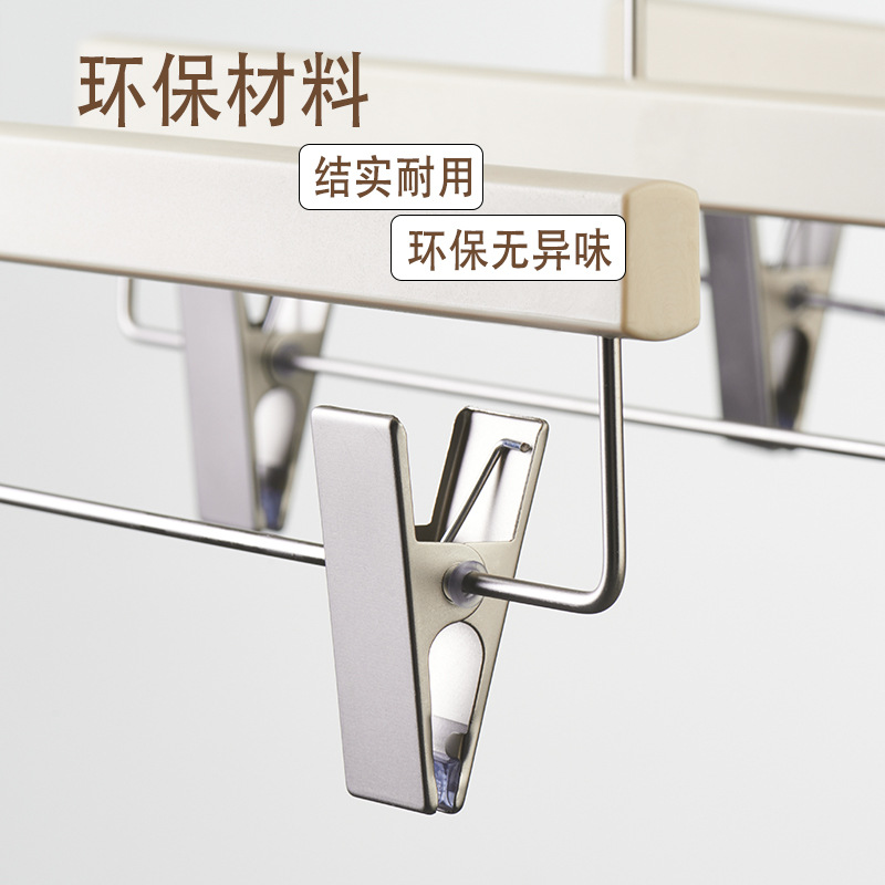 Wholesale wood-like off-white anti-slip and traceless clothes hangers for light luxury women's clothing stores Item Picture