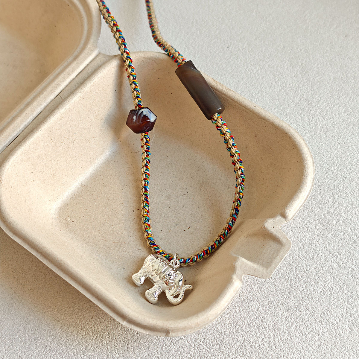 Woven colorful rope natural stone elephant pendant necklace, light luxury, niche artistic and individual, layered sweater chain accessory for autumn and winter Application Scenario
