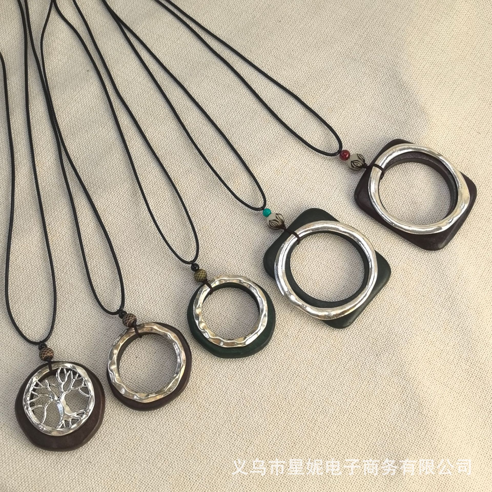 New foreign trade sandalwood alloy ring, retro leather rope, sweater chain, cotton and linen clothing pendant, long women's necklace details Picture