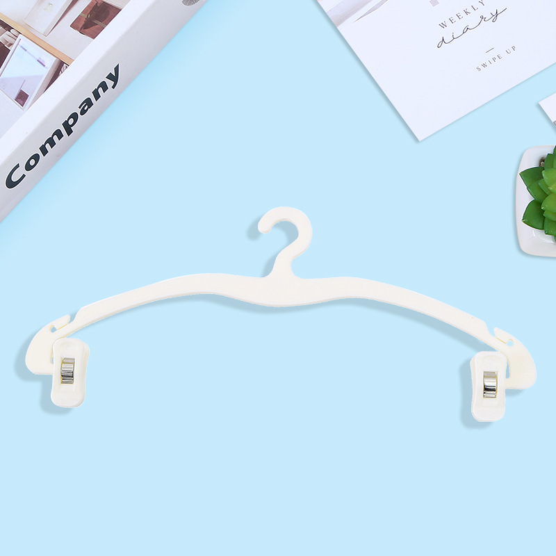 Wholesale of simple Japanese-style anti-slip trouser racks, plastic trouser hanging clips, traceless clothes hangers, and household underwear stretch clips