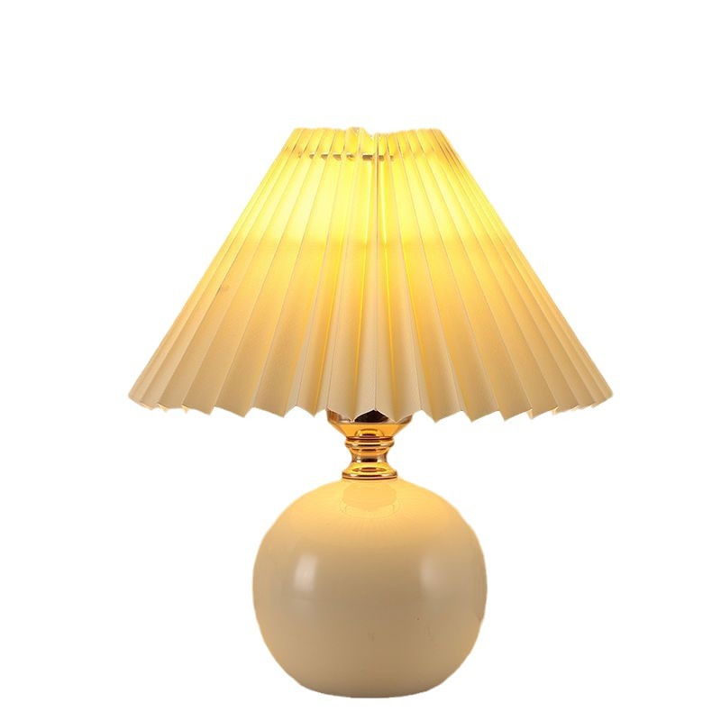 Nordic InS-style bedroom bedside lamp, Internet celebrity, warm and cozy night light for a young girl breastfeeding, high-end ceramic pleated table lamp Item Picture