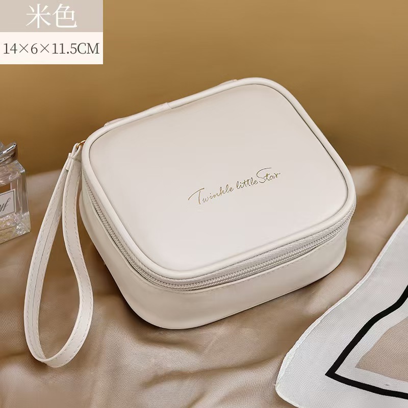 New PU mini portable sanitary napkin storage bag, waterproof hand-held multi-functional cream lipstick makeup bag Specification image