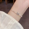 Summer's new cute cartoon diamond-encrusted four-leaf flower KT cat bracelet, stylish, light luxury and versatile pull-out accessory Application Scenario
