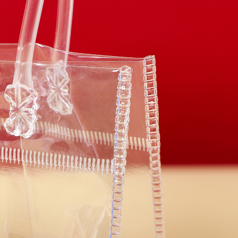 Transparent PVC handbags, hand-held wedding candies, cosmetics, milk tea shopping bags, wedding souvenirs, plastic gift bags details Picture