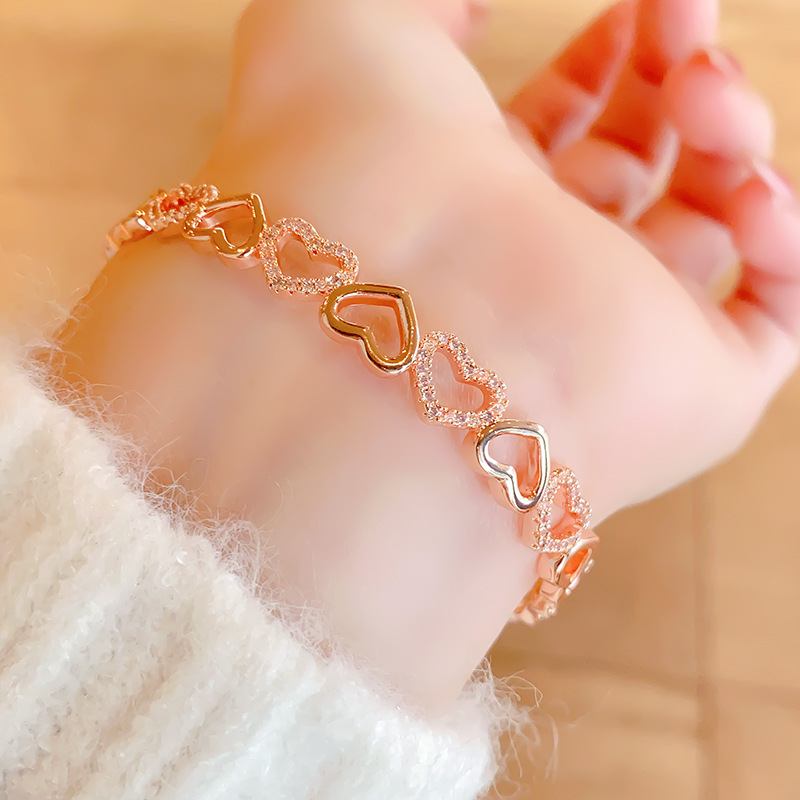 French light luxury hollowed-out heart bracelet, 18k real gold jewelry, open heart bracelet details Picture
