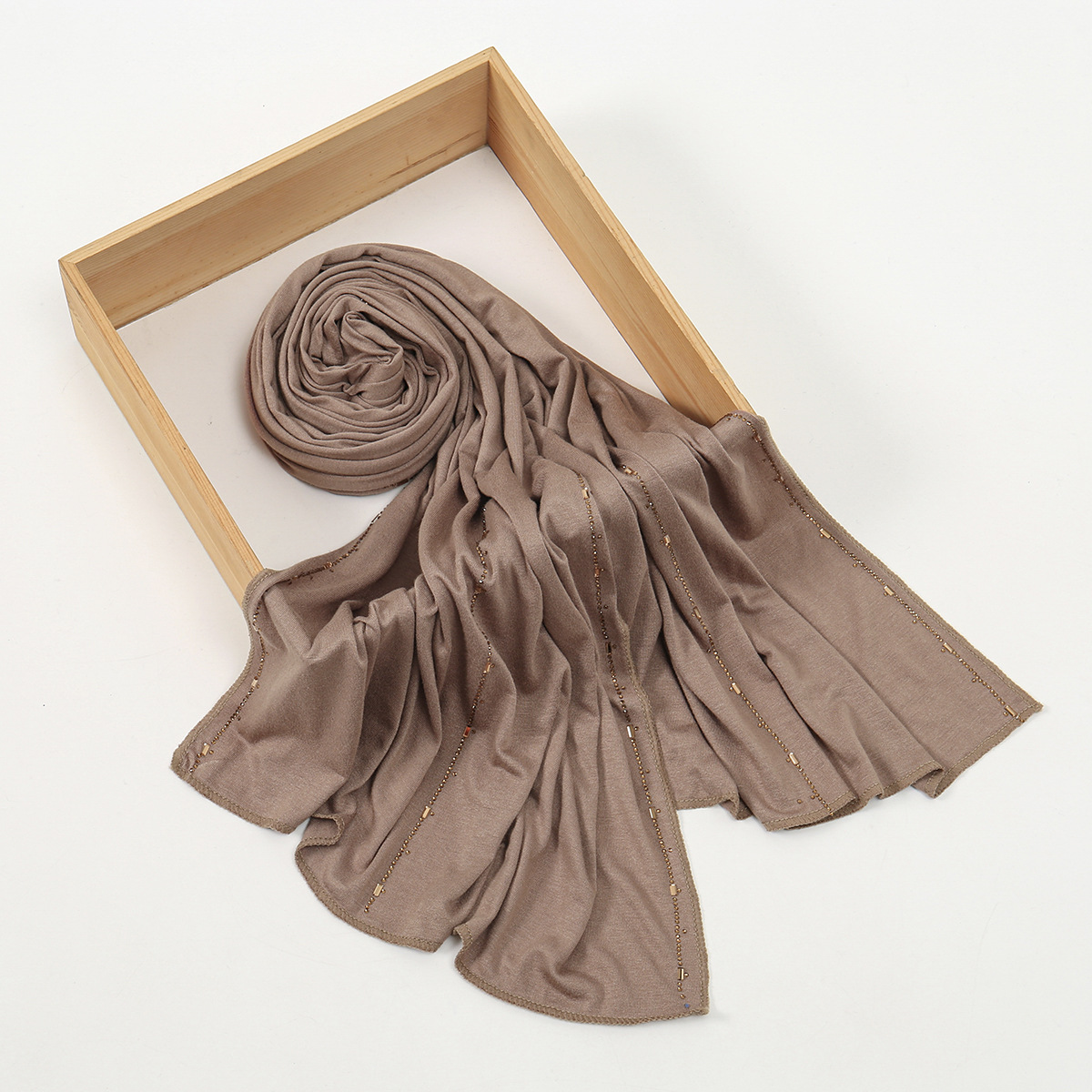Wholesale of new Modal solid-color embossed diamond long scarves and headscarves. High-quality, breathable, soft to the touch, and lustrous cotton scarves for women details Picture