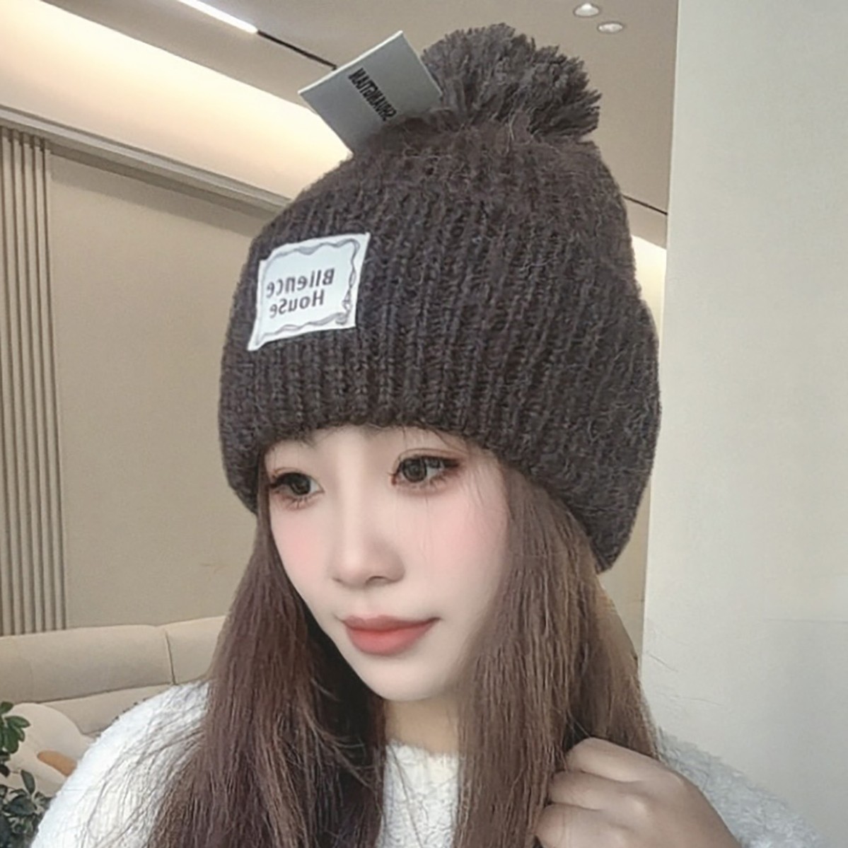 Yellow pom-pom knitted woolen cap for women's autumn and winter headwear, warm pullover cap, face-making small and cold-proof headscarf Application Scenario
