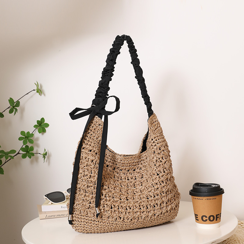Fashionable large-capacity single-shoulder straw woven bag, new hollowed-out bow straw woven bag, women's beach vacation bag
