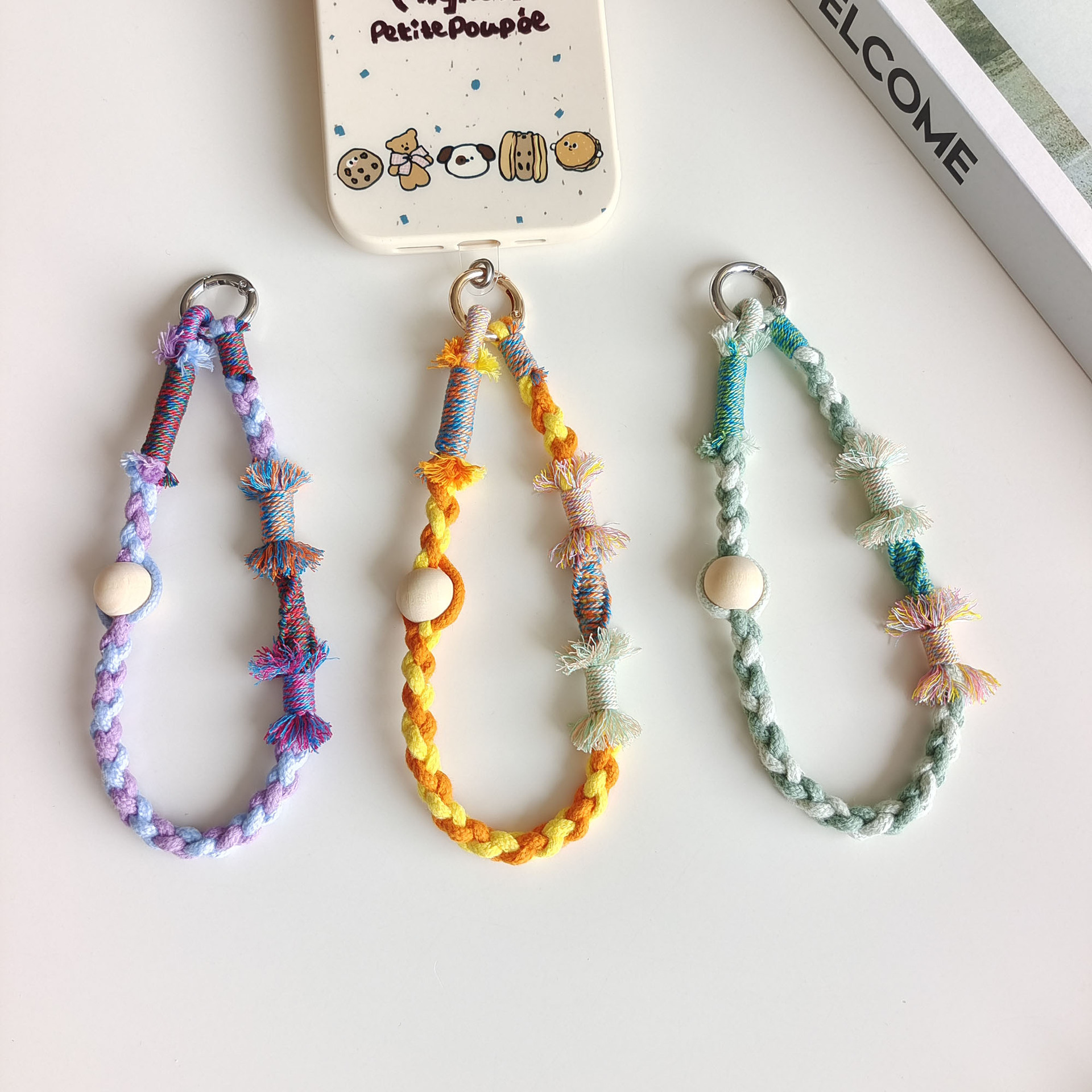 Tibetan-style color-blocked mobile phone lanyards, hand-woven colorful cotton ropes, wooden beads, wrist straps, bags, keychains, anti-loss pendants