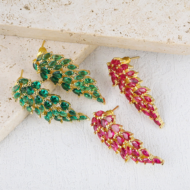 European and American cross-border creative colored zircon inlaid symmetrical angel wing-shaped stud earrings for women cross-border wholesale