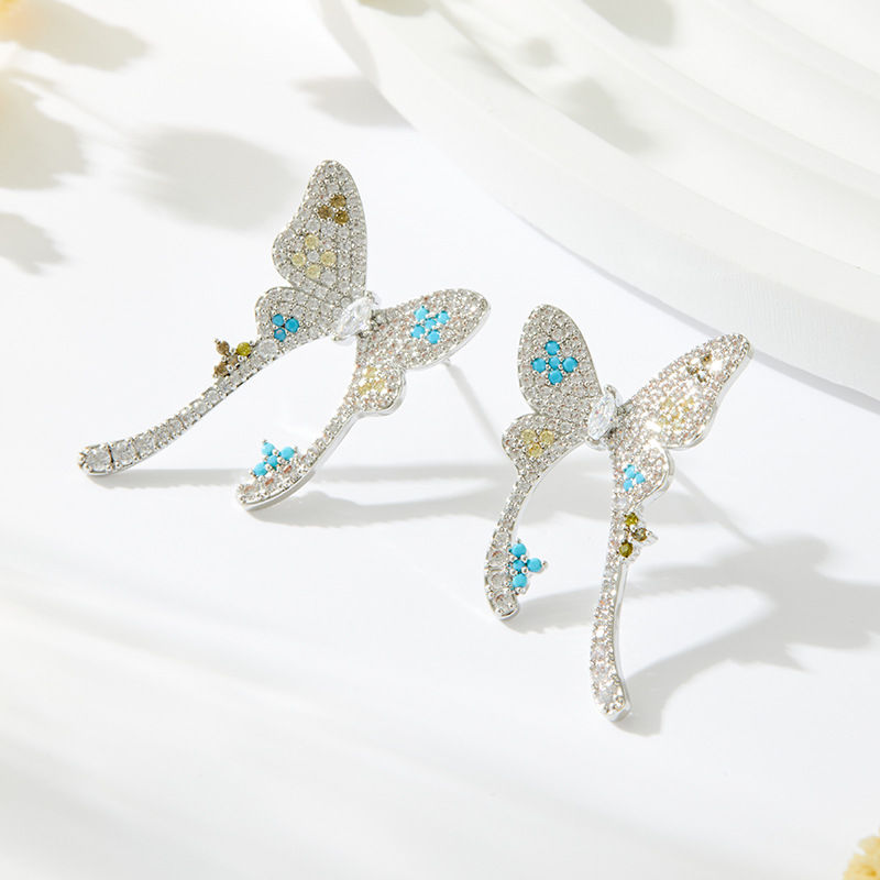 Elegant and high-end butterfly stud earrings, made of copper alloy with micro-inlaid zirconium s925 silver needles, are light luxury French long and exquisite earrings Application Scenario