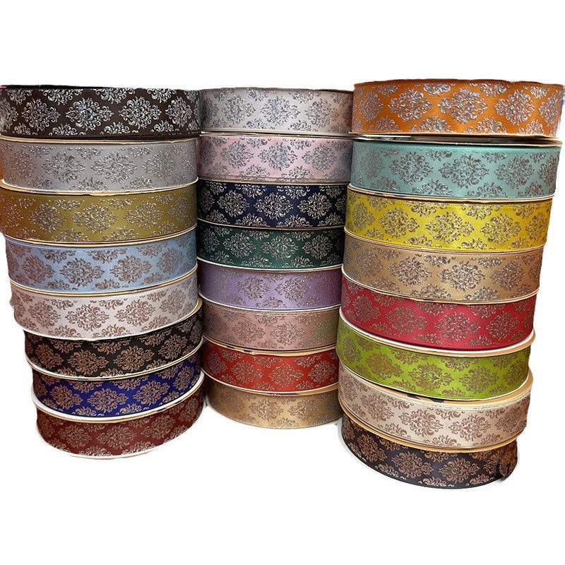 2.5cm totem laser-embossed silver ribbon, bar tray, diy colorful ribbon, flower gift packaging, bow webbing Item Picture