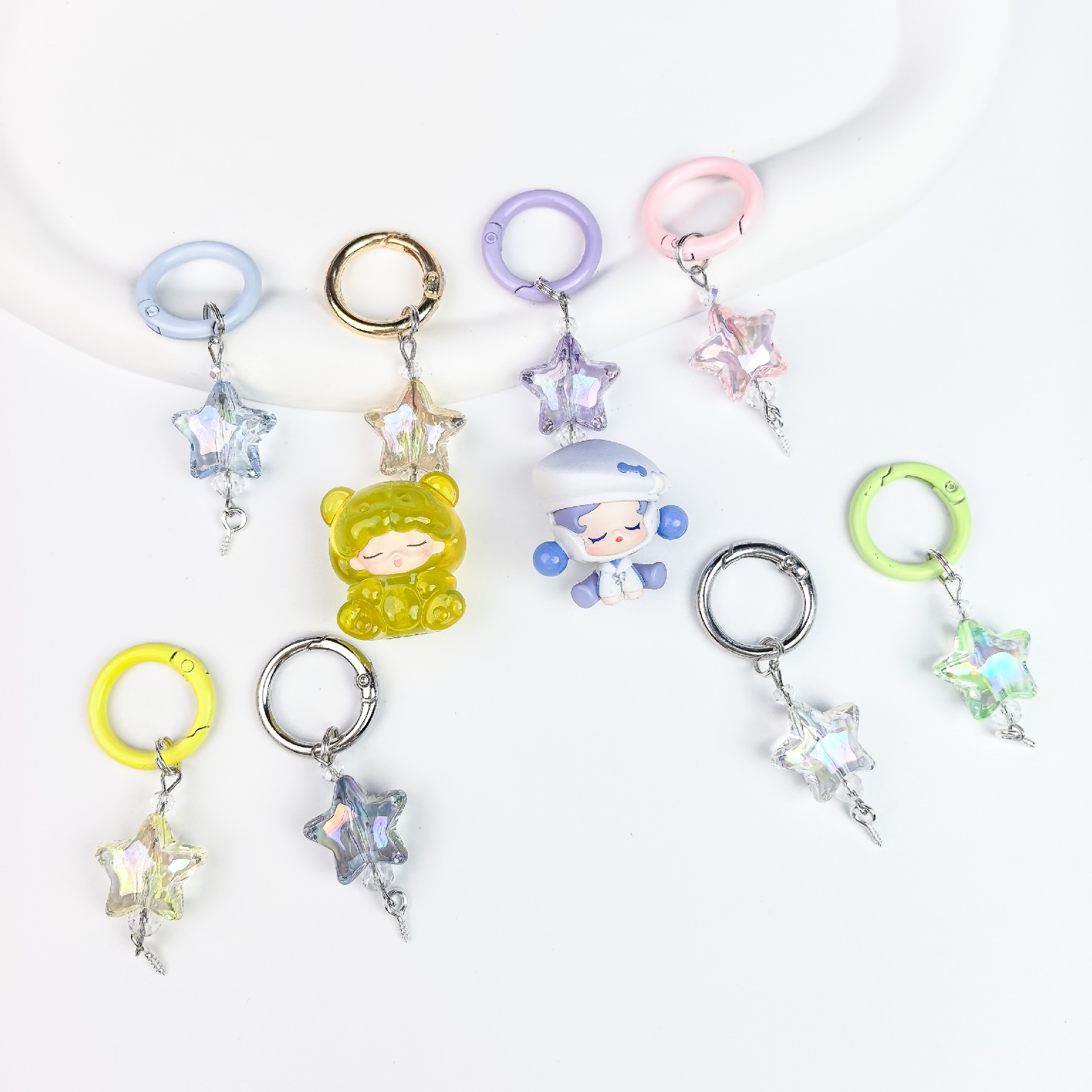 New Uv Transparent Heart-Shaped Star Multi-Color Keychain, Sheep Horn Nail, Cute Particle Blind Box, Diy Pendant, Mobile Phone Hanger Wholesale Item Picture