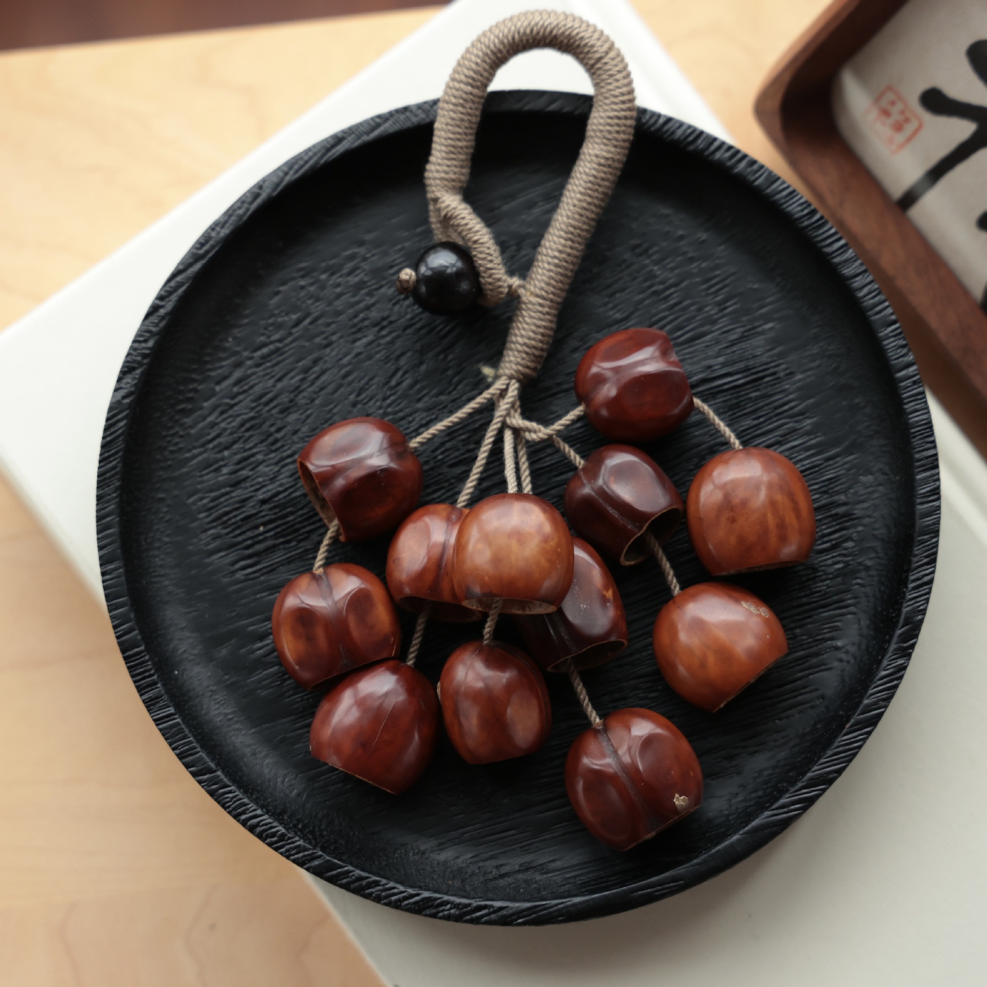 Fruit shell bell sound beam wind chime fruit hand bell string accompaniment meditation sound therapy instrument hand bell ethnic style manufacturer Application Scenario