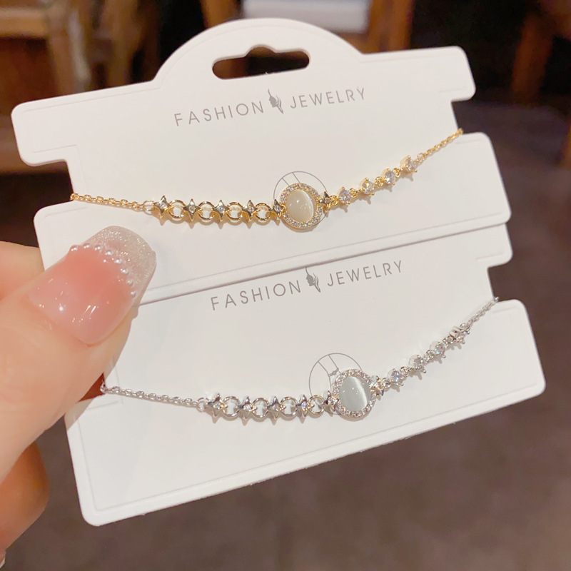 Korean-style, fashionable and simple diamond-encrusted cat's eye stone circular bracelet, personalized, light luxury, versatile and high-end jewelry wholesale