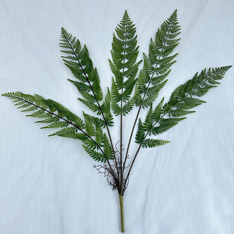 The new wedding home hotel landscape decoration features simulated green plant and fern leaf ground landscaping, complemented by plant fern leaves Specification image