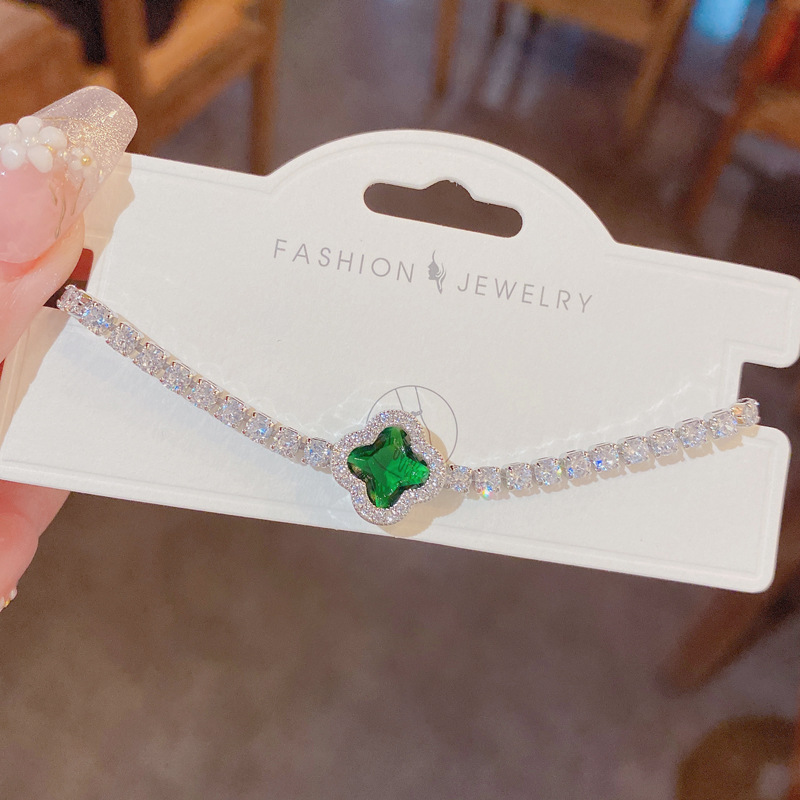 The 2023 summer new micro-inlaid zirconium four-leaf flower bracelet is a unique, luxurious and elegant adjustable jewelry item for female Internet celebrities details Picture