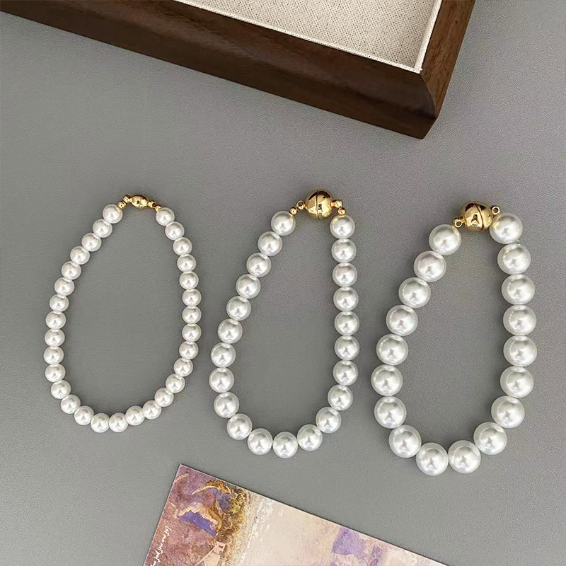 This is a trendy accessory for women, featuring a strong Australian white round magnetic pearl bracelet. It exudes a light luxury, niche and high-end vibe details Picture