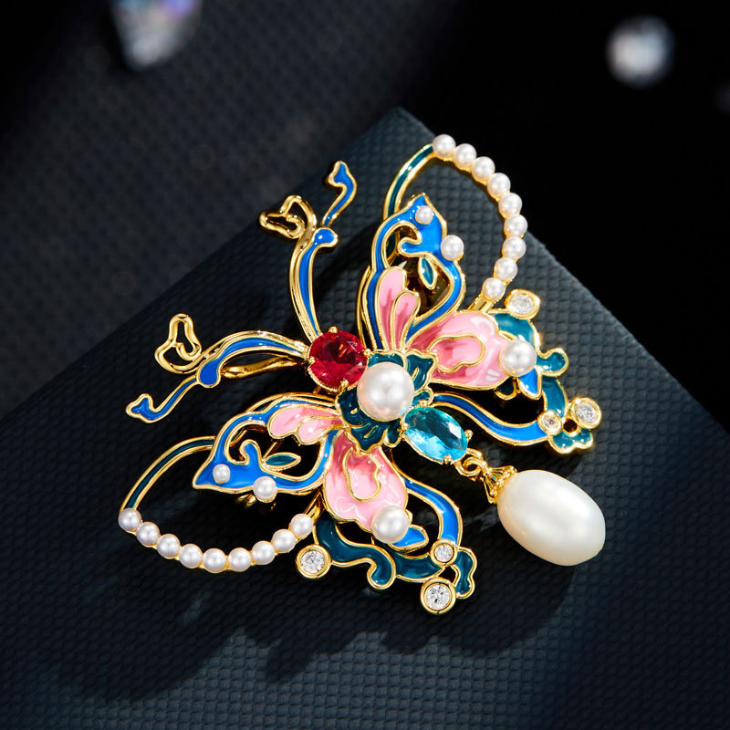 Exquisite national trend enamel butterfly pearl brooch with a fashionable and high-end feel, copper alloy inlaid zircon dress brooch Exquisite national trend enamel butterfly pearl brooch with a fashionable and high-end feel, copper alloy inlaid zircon dress brooch