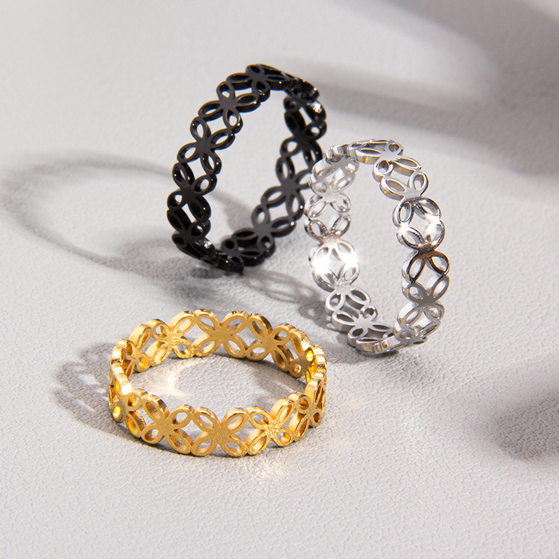 Laser-cut four-leaf flower hollowed-out titanium steel women's rings and couple rings in the style of Instagram in Japan and South Korea Application Scenario