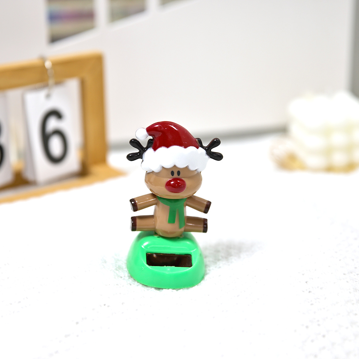 Cross-border new product creative solar-powered automatic rocker Christmas holiday deer man car accessory is available for wholesale Specification image