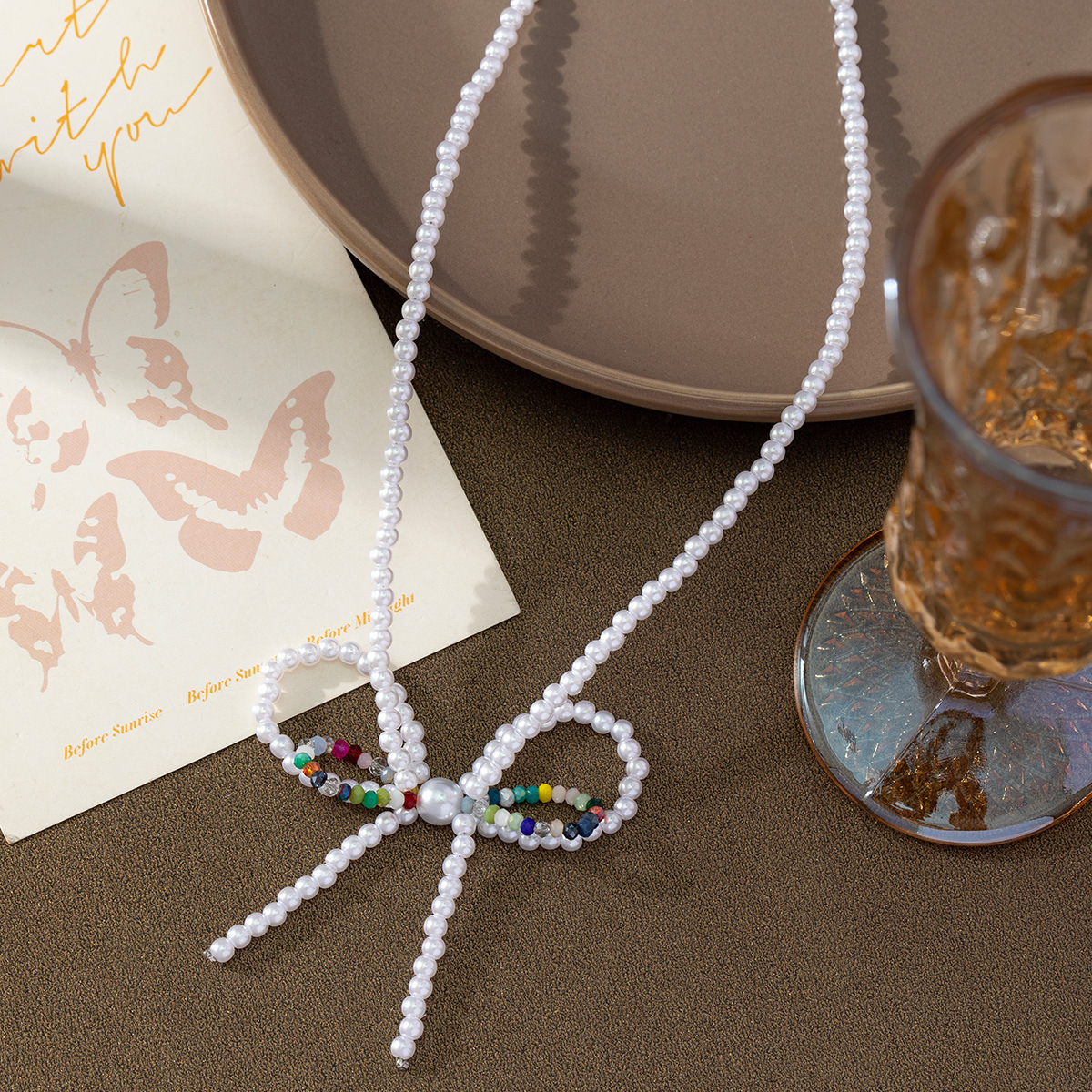 Simple and fashionable bow crystal pearl necklace, popular online, fresh and sweet design sense collarbone chain new style wholesale details Picture