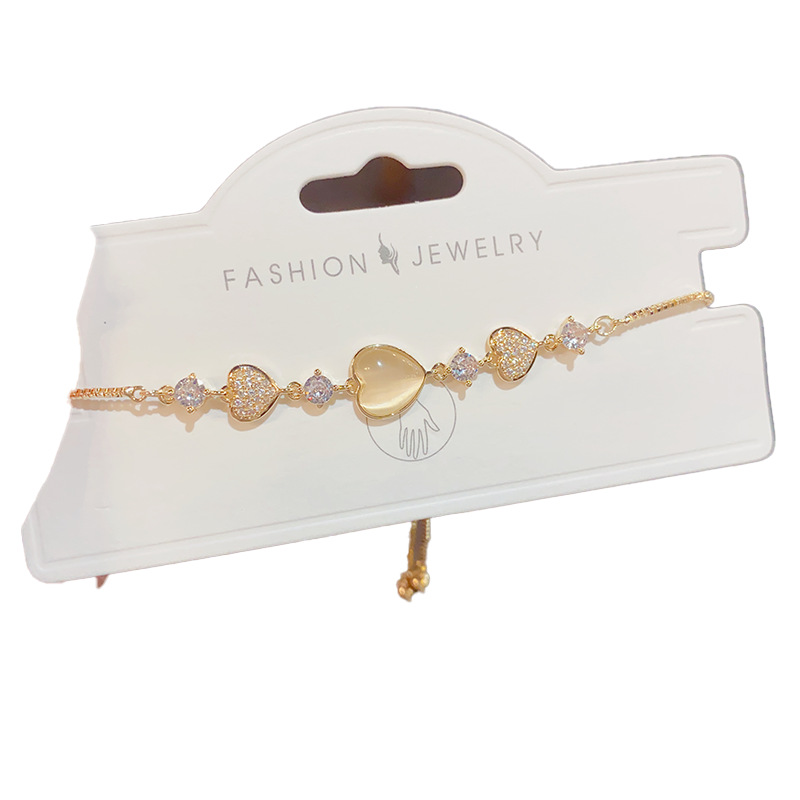 The sweet and light luxury cat's eye stone heart-shaped pull-out bracelet of the same style as Douyin, with a fashionable and high-end feel, is a simple and versatile bracelet Item Picture