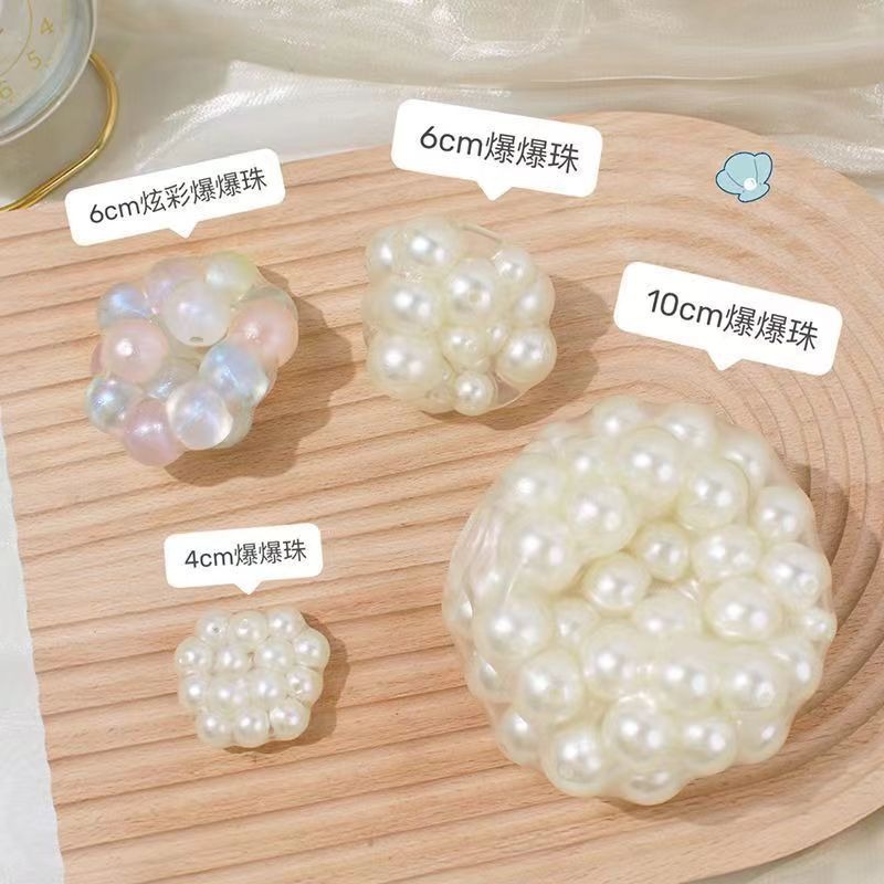 The same style as Xiaohongshu, the creative pearl plate string stress-relieving toy ball, a popular online release of the noisy ball Specification image