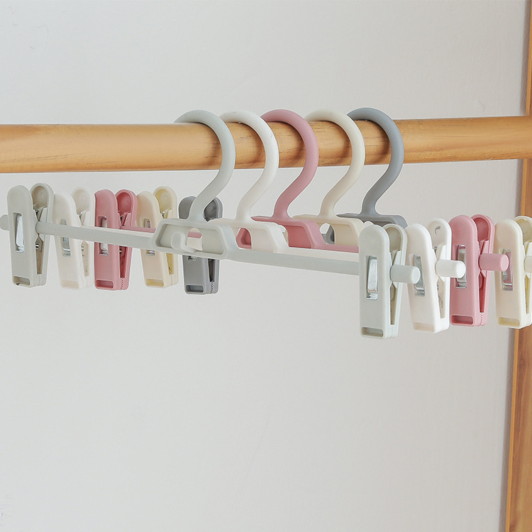 Multi-functional multi-layer clothes hanger for drying, retractable plastic pants, hanging and stacking pants rack, home storage clothes and pants clip details Picture
