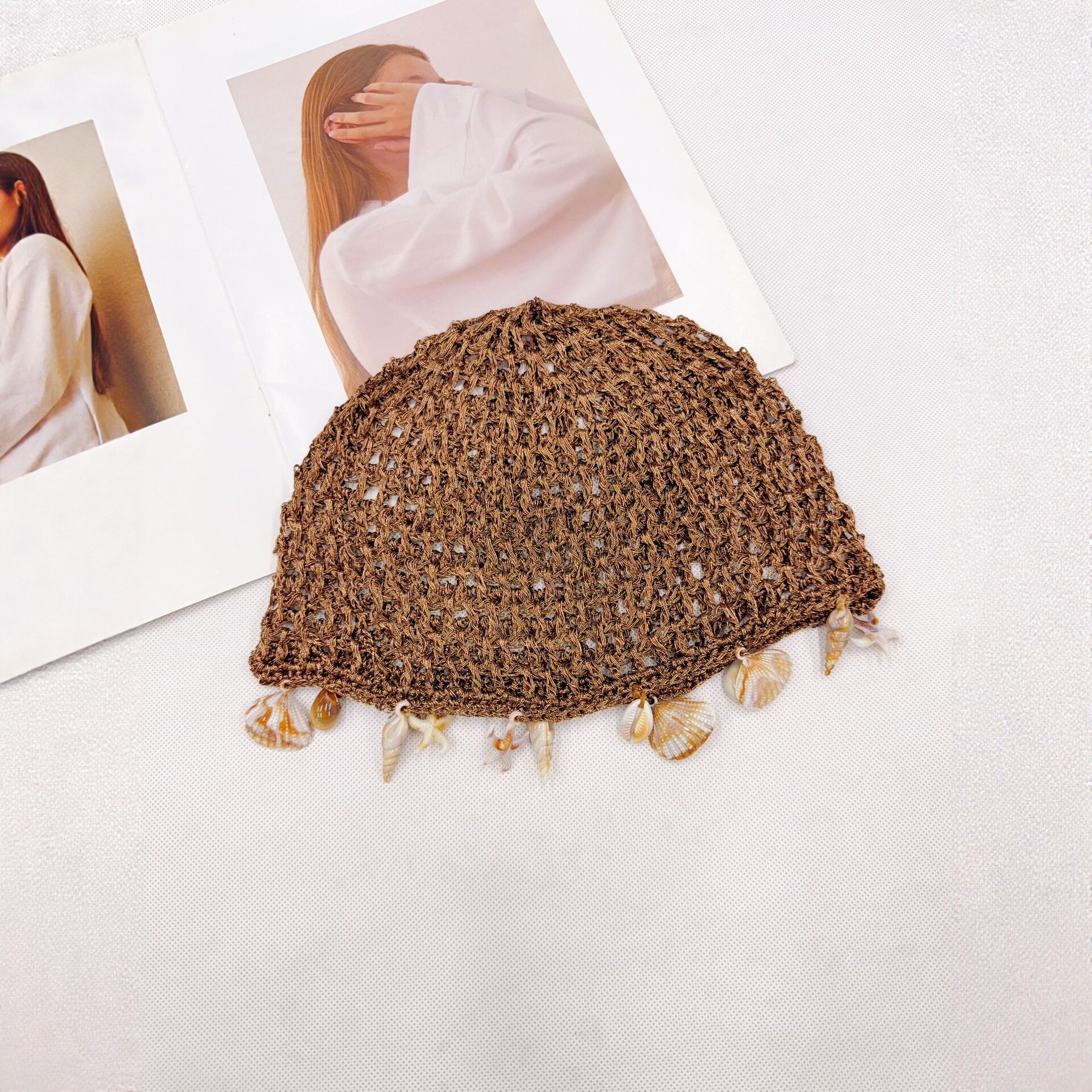 Handcrafted crochet hollowed-out shell decorated headpiece hat for women, spring and summer breathable fisherman's hat, fashionable and versatile knitted hat Specification image