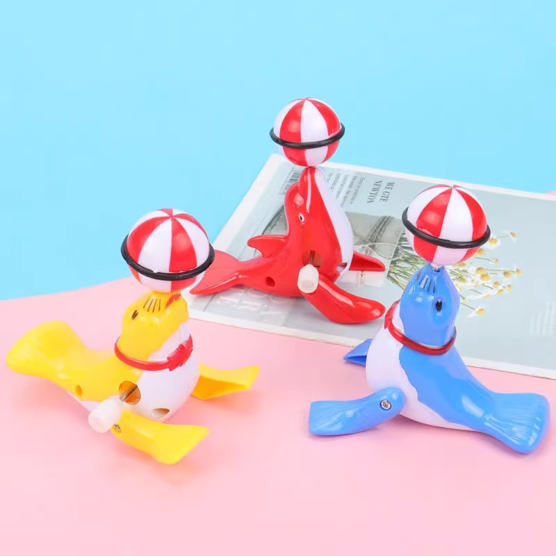 Wound wound dolphin, rotating sea lion, small sea lion toy, wound wound toy, street stall, Children's Day small gifts details Picture