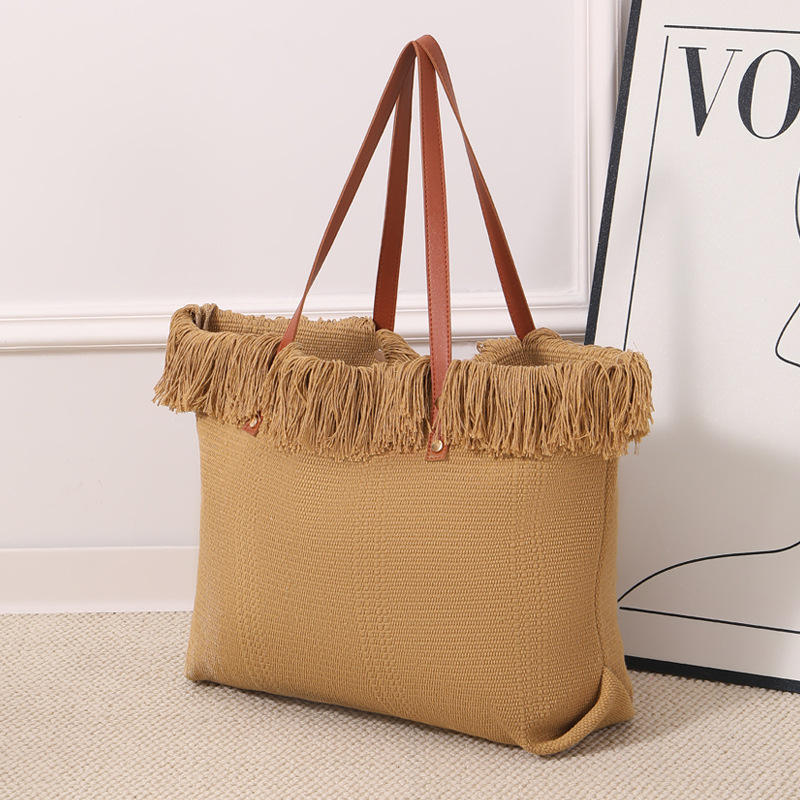 Cross-border canvas bag, fringed handbag, large-capacity portable and simple fringed tote bag, large-capacity simple hand-held shoulder canvas bag, commuting woven beach bag, women's canvas bag